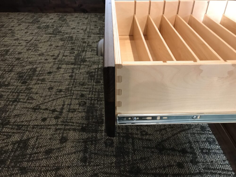 Divided desk drawer